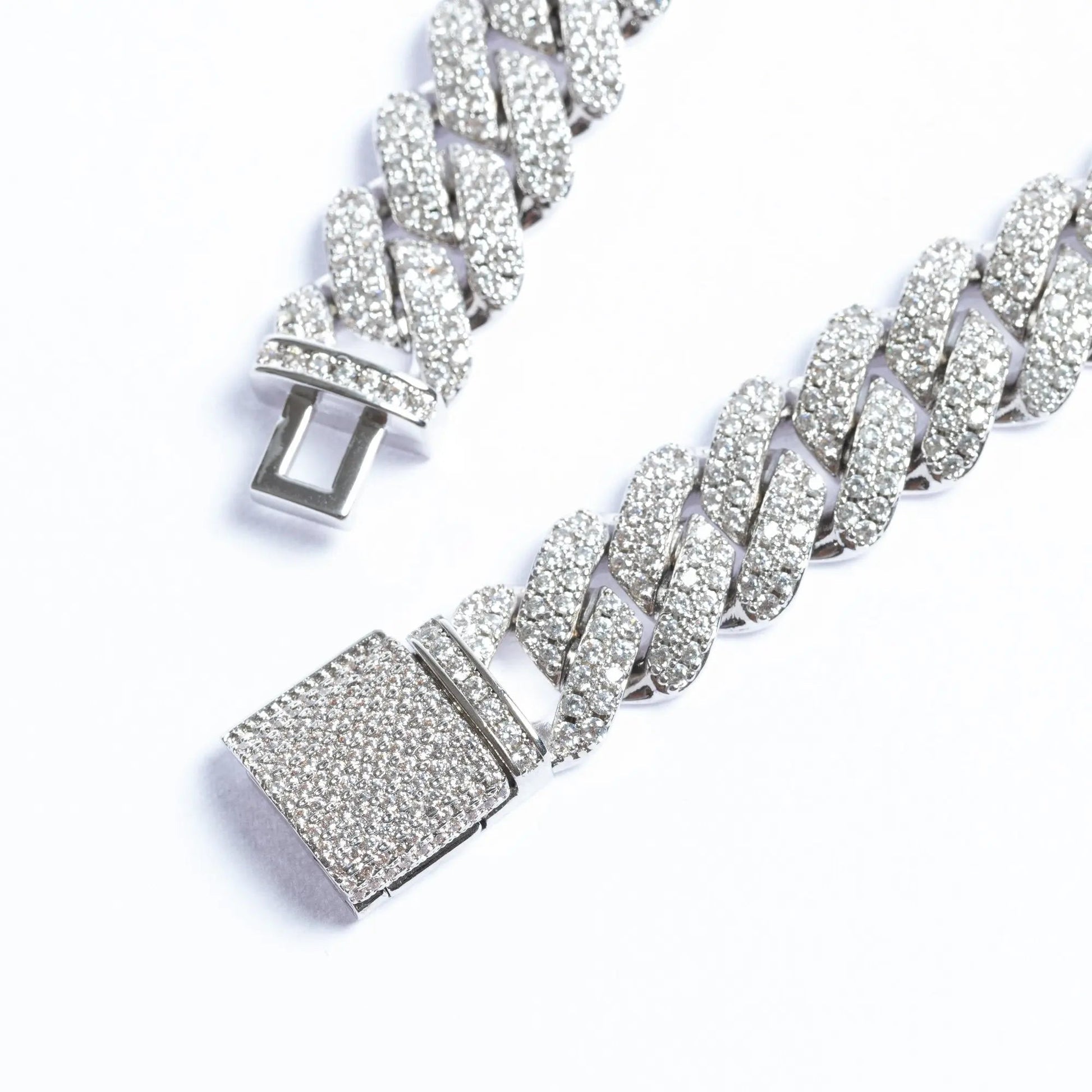 White Gold Prong Cuban Link Chain On White Background